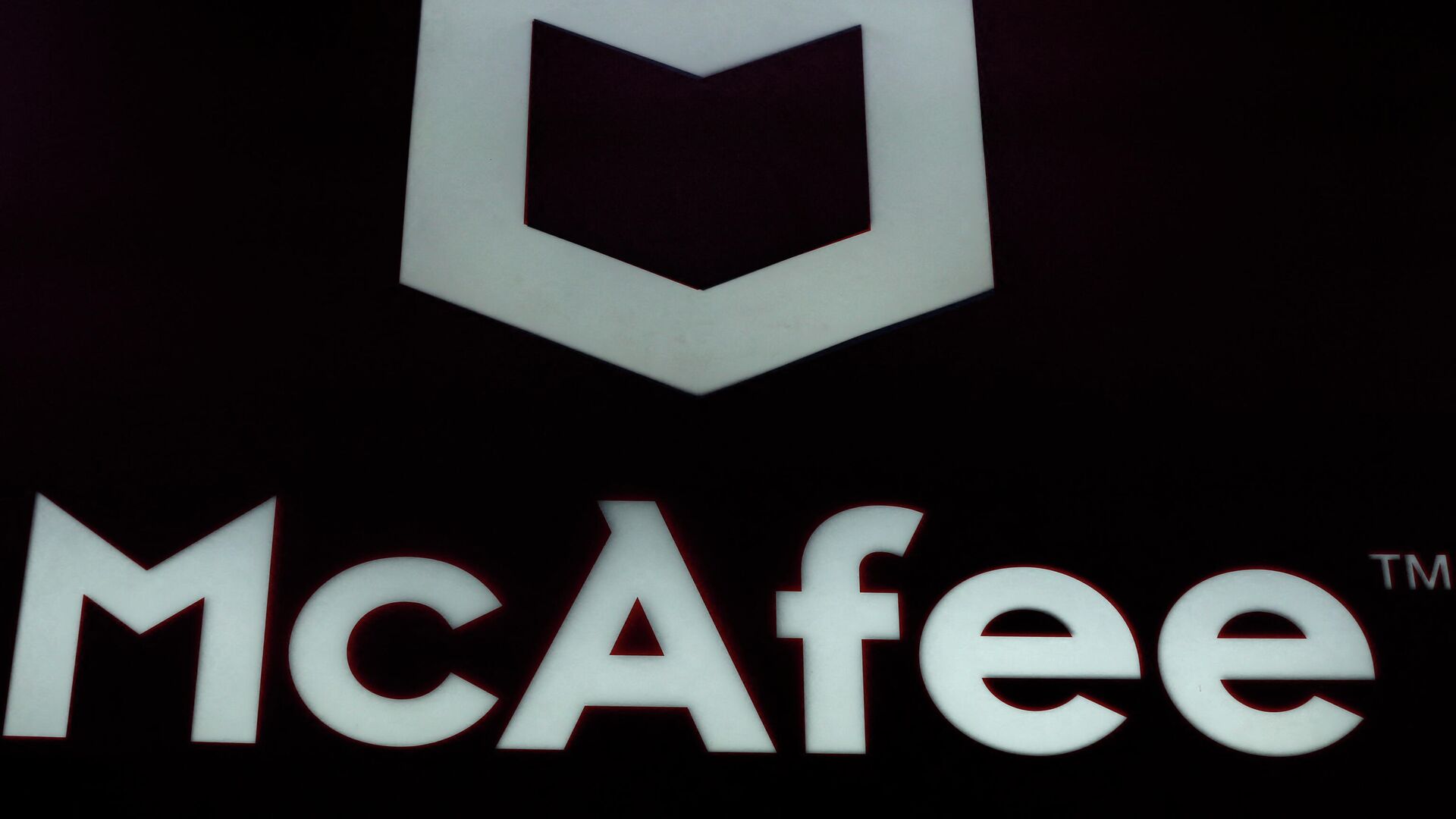 In this file photo taken on February 25, 2019 The McAfee logo is displayed at the Mobile World Congress (MWC) in Barcelona on February 25, 2019. - Sputnik International, 1920, 08.11.2021