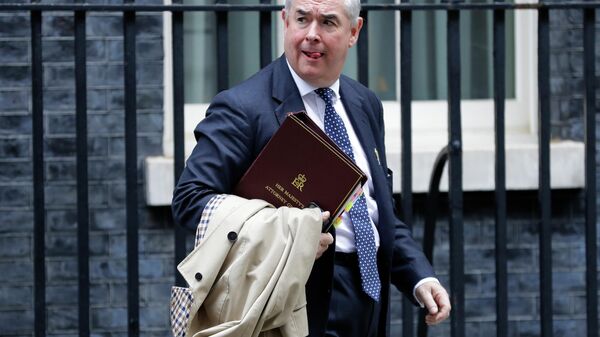 Britain's Attorney General Geoffrey Cox leaves after attending a cabinet meeting at Downing Street in London, Thursday, Oct. 3, 2019. The U.K. offered the European Union a proposed last-minute Brexit deal on Wednesday that it said represents a realistic compromise for both sides, as British Prime Minister Boris Johnson urged the bloc to hold rapid negotiations towards a solution after years of wrangling.  - Sputnik International