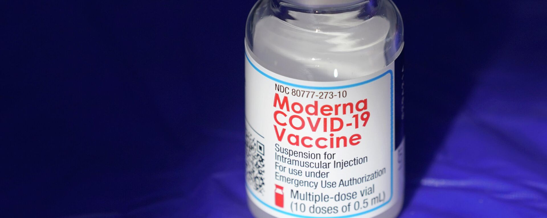 In this March 4, 2021 file photo, a vial of the Moderna COVID-19 vaccine rests on a table at a drive-up mass vaccination site in Puyallup, Wash., south of Seattle. - Sputnik International, 1920, 22.12.2021