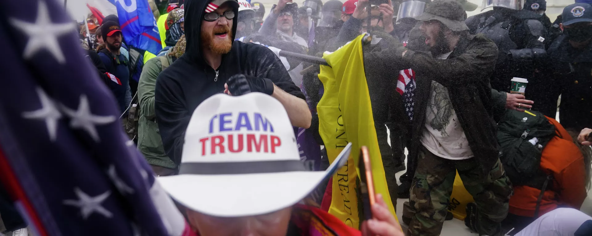 In this Jan. 6, 2021, file photo, insurrections loyal to President Donald Trump try to break through a police barrier at the Capitol in Washington. U.S. - Sputnik International, 1920, 28.12.2024