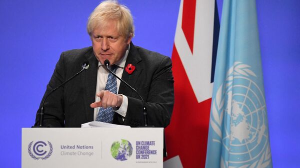 Britain's Prime Minister Boris Johnson speaks during a press conference at the COP26 UN Climate Change Conference in Glasgow on November 10, 2021 - Sputnik International