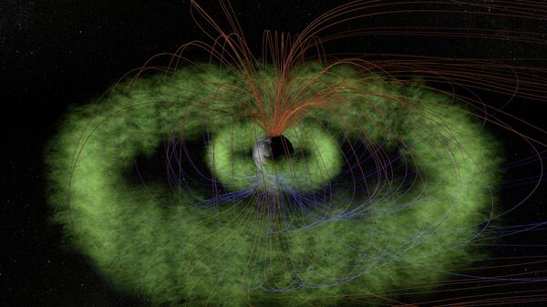 This NASA  artist's conception released on August 31, 2012 shows the radiation belts (green), which are two doughnut-shaped (torus) regions full of high-energy particles that fill the near-space around Earth - Sputnik International