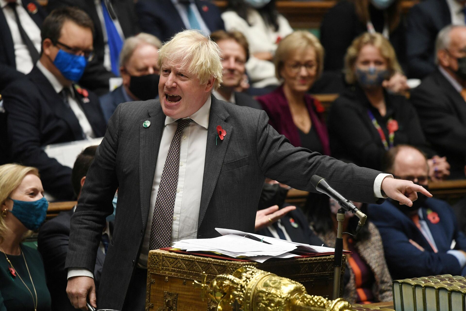 A handout photograph released by the UK Parliament shows Britain's Prime Minister Boris Johnson speaking during Prime Minister's Questions (PMQs) at the House of Commons, in central London on November 3, 2021  - Sputnik International, 1920, 23.11.2021