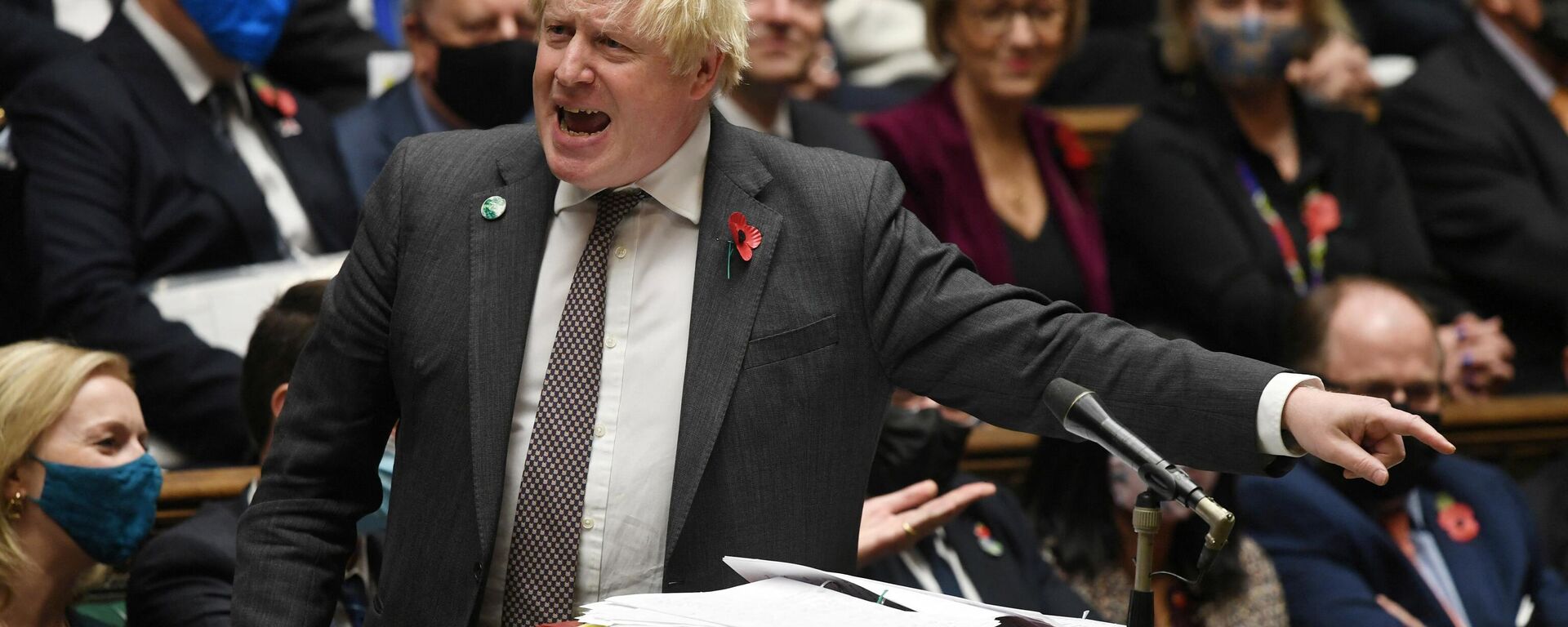 A handout photograph released by the UK Parliament shows Britain's Prime Minister Boris Johnson speaking during Prime Minister's Questions (PMQs) at the House of Commons, in central London on November 3, 2021  - Sputnik International, 1920, 30.11.2021