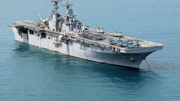 The amphibious assault ship USS Essex (LHD 2) is at anchor in the Gulf of Thailand. File photo  - Sputnik International