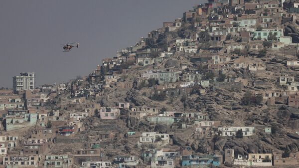 A military helicopter is pictured flying over Kabul, Afghanistan November 4, 2021.REUTERS - Sputnik International
