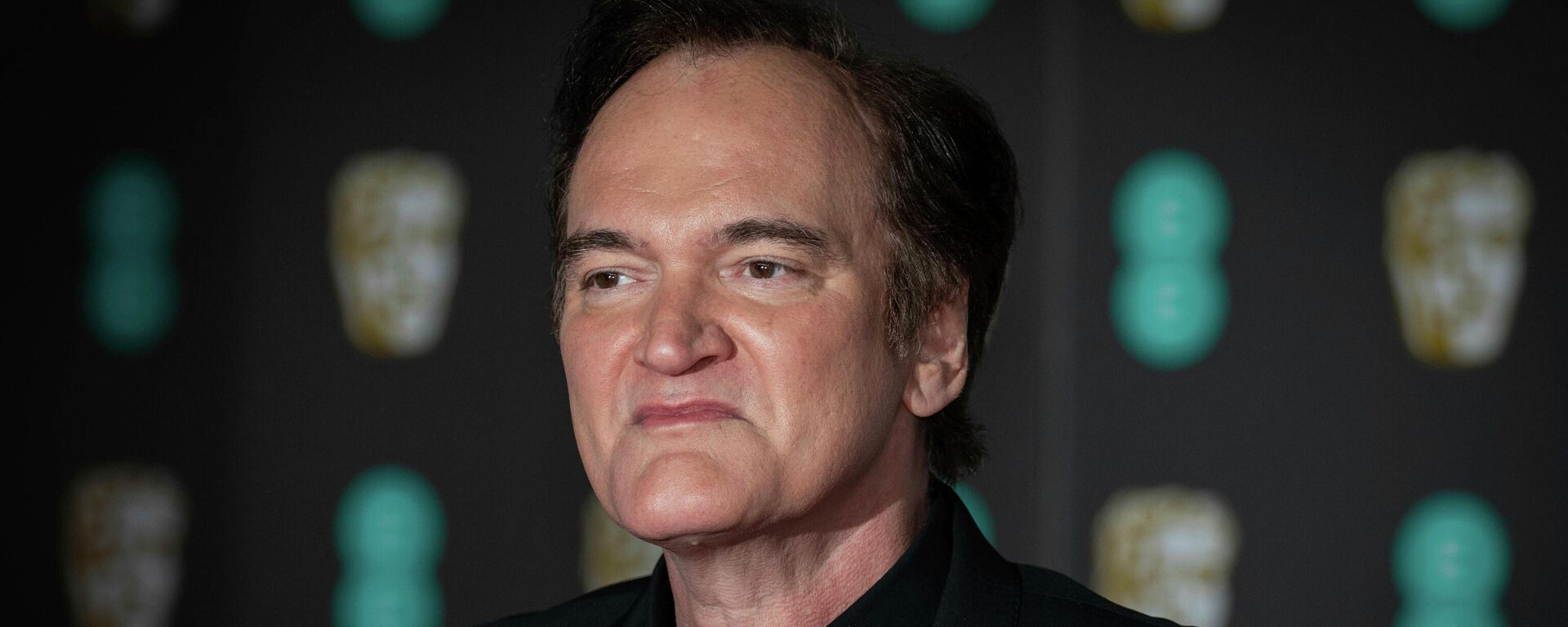 Director Quentin Tarantino poses for photographers upon arrival at the Bafta Film Awards, in central London, Sunday, Feb. 2 2020. - Sputnik International, 1920, 17.11.2021