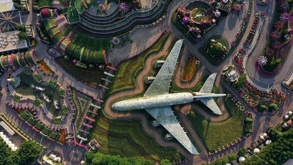 An aerial view shows a structure made of flowers of an Emirates Airlines Airbus A380 that made it to the Guinness Book of World Records, at the Dubai Miracle Garden, the world&#x27;s largest flower garden, in the United Arab Emirates, on  11 November 2020. The Miracle Garden, home to giant floral structures and millions of flower and plant varieties, is open for visitors from 1 November. - Sputnik International