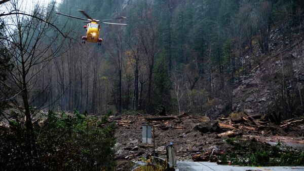 A Royal Canadian Air Force 442 Squadron CH-149 Cormorant helicopter lands during the rescue of over 300 motorists stranded by mudslides, in Agassiz, British Columbia, Canada November 15, 2021 - Sputnik International