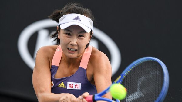 China's Shuai Peng hits a return against Japan's Nao Hibino during their women's singles match on day two of the Australian Open tennis tournament in Melbourne on January 21, 2020.  - Sputnik International