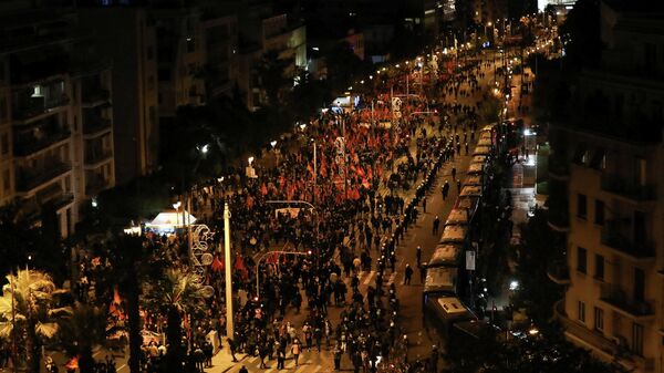 People march in front of the U.S. Embassy during a rally marking the 48th anniversary of 1973 Athens Polytechnic student uprising, in Athens, Greece, November 17, 2021. - Sputnik International