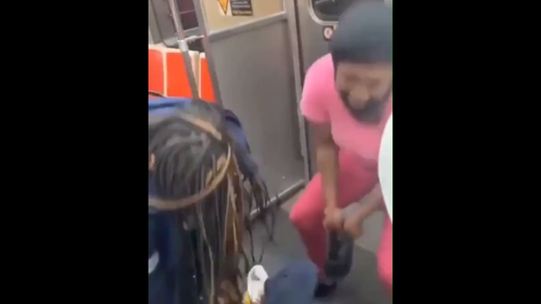 Screenshot from a video showing what is described in reports as an altercation between a group of black and Asian students on a SEPTA train in Philadelphia - Sputnik International