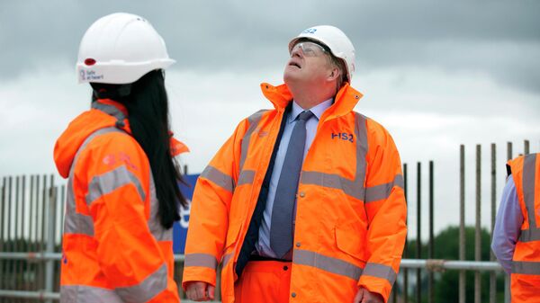 Britain's Prime Minister Boris Johnson during a visit to the HS2 Solihull Interchange building site in Solihull, England, Friday, Sept. 4, 2020. Construction is set to formally begin on Britain’s 106 billion-pound ($140 billion) high-speed railway project, aiming to forge better connections between cities for decades to come. Transport Secretary Grant Shapps defended the project, which has its “shovels in the ground moment just as the country is wondering whether the over-budget and often-delayed project offers good value at a time when the the COVID-19 pandemic has enshrined the idea of working from home.  - Sputnik International