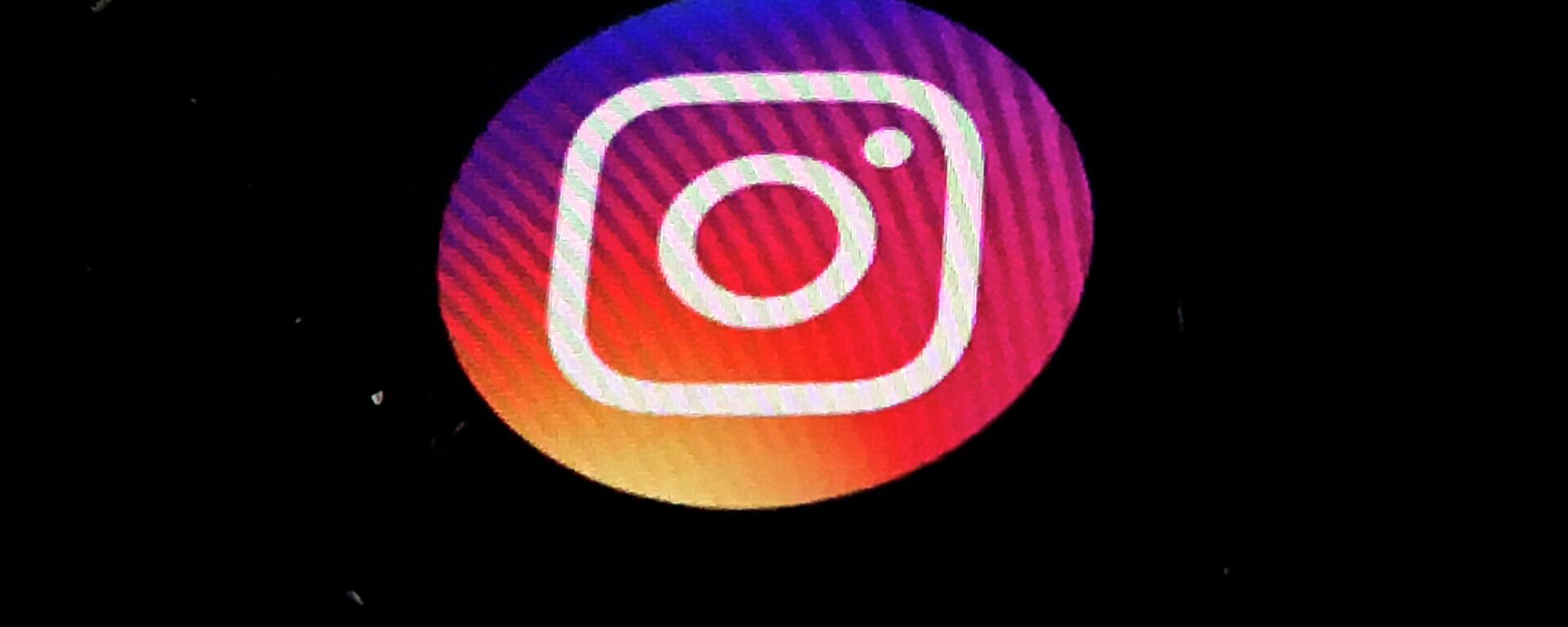 In this Nov. 29, 2018, file photo, the Instagram app logo is displayed on a mobile screen in Los Angeles. Political adversaries in Congress are united in outrage against Facebook for privately compiling information that its Instagram photo-sharing service appeared to grievously harm some teens, especially girls, while publicly downplaying the popular platform’s negative impact. - Sputnik International, 1920, 01.03.2022