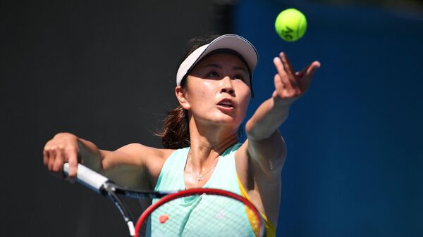(FILES) This file photo taken on January 13, 2019 shows China's Peng Shuai serving the ball during a practice session ahead of the Australian Open tennis tournament in Melbourne - Sputnik International