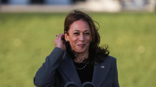 U.S. Vice-President Kamala Harris reacts at the ceremony where U.S. President Joe Biden will sign the Infrastructure Investment and Jobs Act, on the South Lawn at the White House in Washington, U.S., November 15, 2021 - Sputnik International