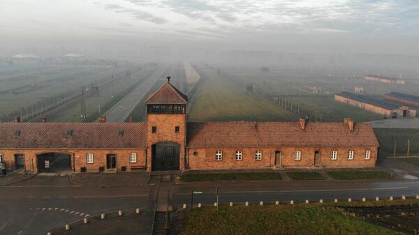 An aerial picture taken on December 15, 2019 in Oswiecim, Poland, shows a view of the railway entrance to former German Nazi death camp Auschwitz II - Birkenau with its SS guards tower. The site has been turned into a museum and memorial site. - The Auschwitz camp was established by the Nazis in 1940, in the suburbs of the city of Oswiecim which, like other parts of Poland, was occupied by the Germans during the Second World War. The name of the city of Oswiecim was changed to Auschwitz, which became the name of the camp as well. Over the following years, the camp was expanded and consisted of three main parts: Auschwitz I, Auschwitz II-Birkenau, and Auschwitz III-Monowitz. - Sputnik International