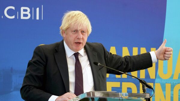 Prime Minister Boris Johnson speaks during the CBI (Confederation of British Industry) annual conference, at the Port of Tyne, in South Shields, England, Monday Nov. 22, 2021.  - Sputnik International