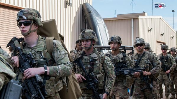 U.S. Soldiers assigned to the East Africa Response Force (EARF), deployed in support of Combined Joint Task Force-Horn of Africa, prepare to depart for Libreville, Gabon, at Camp Lemonnier, Djibouti, Jan. 2, 2019 - Sputnik International
