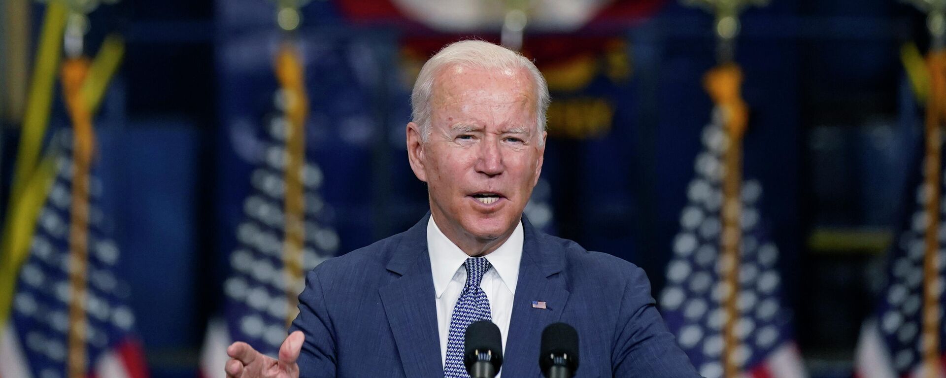 In this Oct. 25, 2021, photo, President Joe Biden speaks at NJ Transit Meadowlands Maintenance Complex to promote his economic agenda in Kearny, N.J. Biden promised to show the world that democracies can work to meet the challenges of the 21st century - Sputnik International, 1920, 24.11.2021