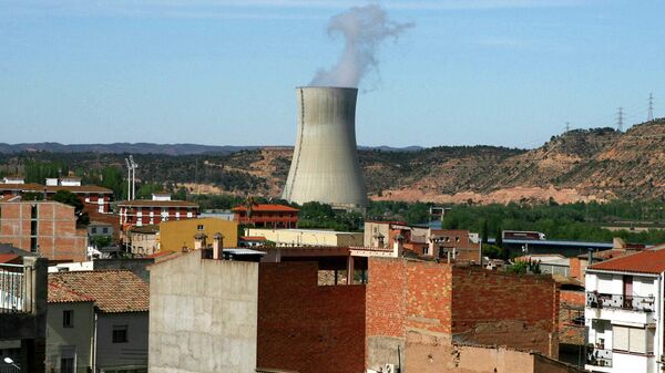 The Asco I nuclear power station, center, is seen near houses in the small town of Asco, Spain in Tuesday, April 15, 2008. Spain's nuclear watchdog agency said Tuesday it is checking about 800 people for contamination after finding that a leak at a nuclear plant in northeast Spain last year was bigger than previously reported. - Sputnik International