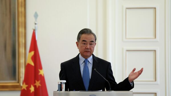 Foreign Minister Wang Yi attends a news conference - Sputnik International