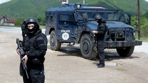 Kosovo police special unit members secure the area near the village of Cabra, north western Kosovo, during an ongoing police operation on Tuesday, May 28, 2019. - Sputnik International