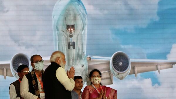 Indian Prime Minister Narendra Modi greets the gathering during the foundation stone laying ceremony of Noida International Airport in Jewar, about 100 kilometers (62 miles) from New Delhi, India, Thursday, Nov. 25, 2021.  - Sputnik International