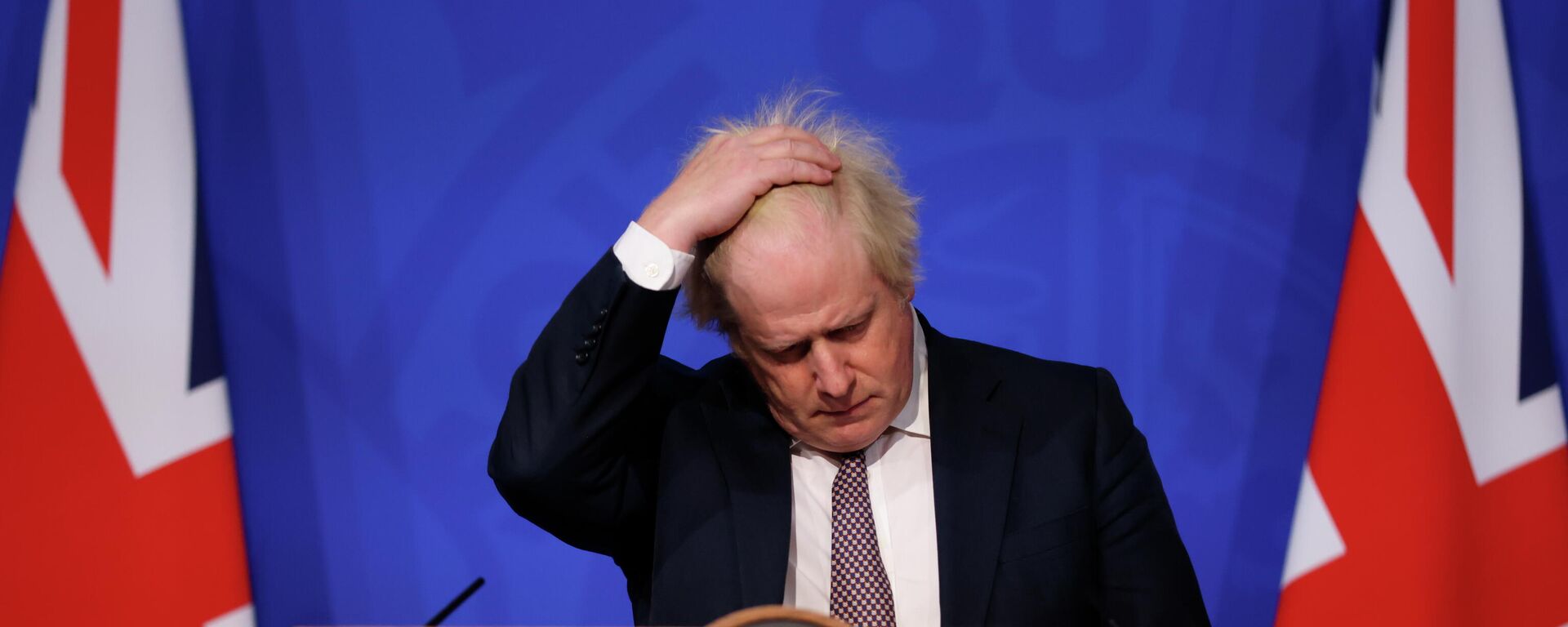 Britain's Prime Minister Boris Johnson gestures as he speaks during a press conference in London, Saturday Nov. 27, 2021, after cases of the new COVID-19 variant were confirmed in the UK - Sputnik International, 1920, 12.12.2021