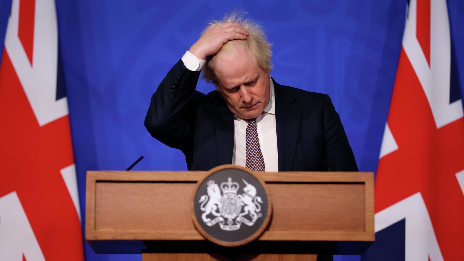 Britain's Prime Minister Boris Johnson gestures as he speaks during a press conference in London, Saturday Nov. 27, 2021, after cases of the new COVID-19 variant were confirmed in the UK - Sputnik International, 1920, 12.12.2021
