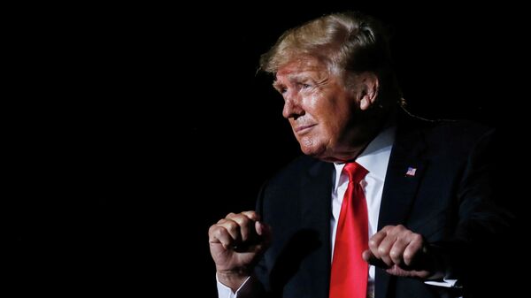 FILE PHOTO: Former U.S. President Donald Trump reacts after his speech during a rally at the Iowa States Fairgrounds in Des Moines, Iowa, U.S., October 9, 2021 - Sputnik International