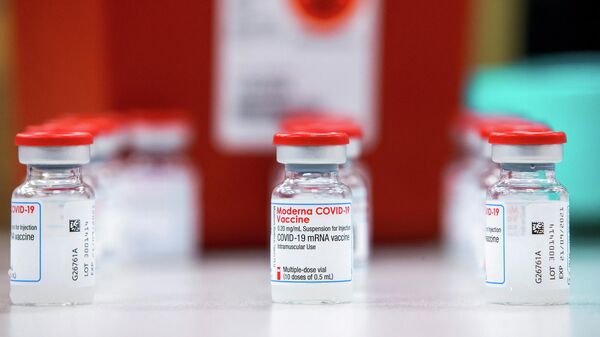 Vials of the Moderna COVID-19 vaccine are seen at Apotex pharmaceutical company in Toronto, Ontario, Canada April 13, 2021. - Sputnik International