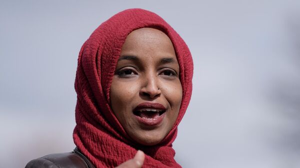 In this April 20, 2021, file photo Rep. Ilhan Omar, D-Minn., speaks in Brooklyn Center, Minn., during a news conference at the site of the fatal shooting of Daunte Wright by a police officer during a traffic stop. - Sputnik International