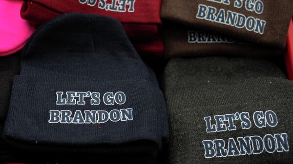 Merchandise on display for purchase as supporters attend a Let's Go Brandon Festival rally, promoted by the Michigan Conservative Coalition and in opposition to U.S. President Joe Biden, in the Brandon Township village of Ortonville, Michigan, U.S. November 20, 2021. - Sputnik International