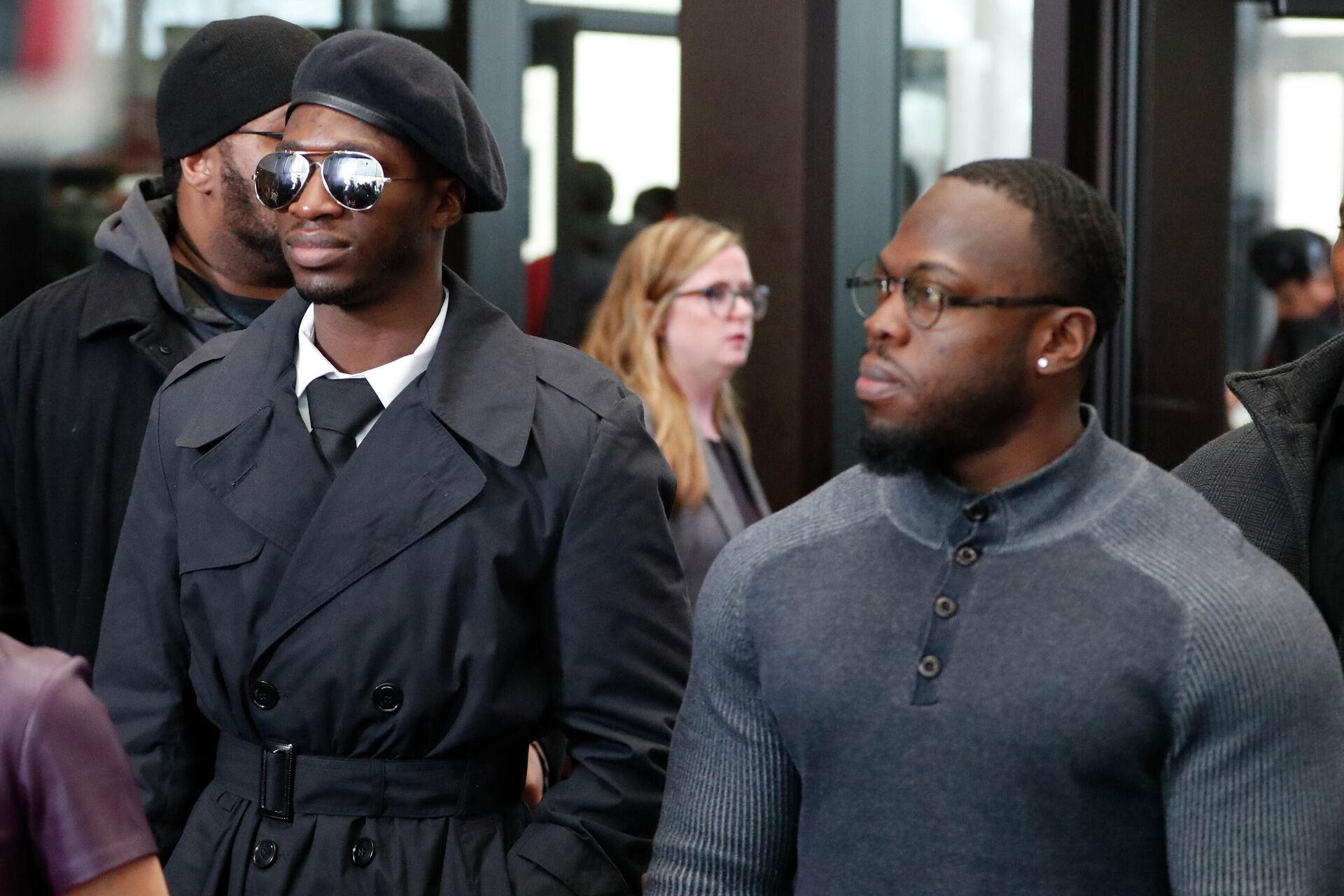 Brothers Olabinjo Osundairo, right, and Abimbola Osundairo, who claim actor Jussie Smollett hired them to stage an attack on him, appear outside the Leighton Criminal Courthouse in Chicago, Monday, Feb. 24, 2020, after Smollett's court appearance on a new set of charges alleging that he lied to police about being targeted in a racist and homophobic attack in downtown Chicago early last year. - Sputnik International, 1920, 01.12.2021