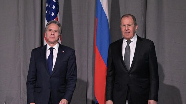 US Secretary of State Antony Blinken (L) and Russian Foreign Minister Sergei Lavrov pose for journalists at the start of their meeting on the sidelines of the Organization for Security and Co-operation in Europe (OSCE) meeting in Stockholm, on December 2, 2021. - Sputnik International