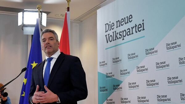 Austria's Interior Minister and OeVP General-Secretary Karl Nehammer addresses a press conference to announce that he has been named as Austria's new chancellor during a meeting of Austria's conservative People's Party OeVP in Vienna on December 3, 2021. - Sputnik International