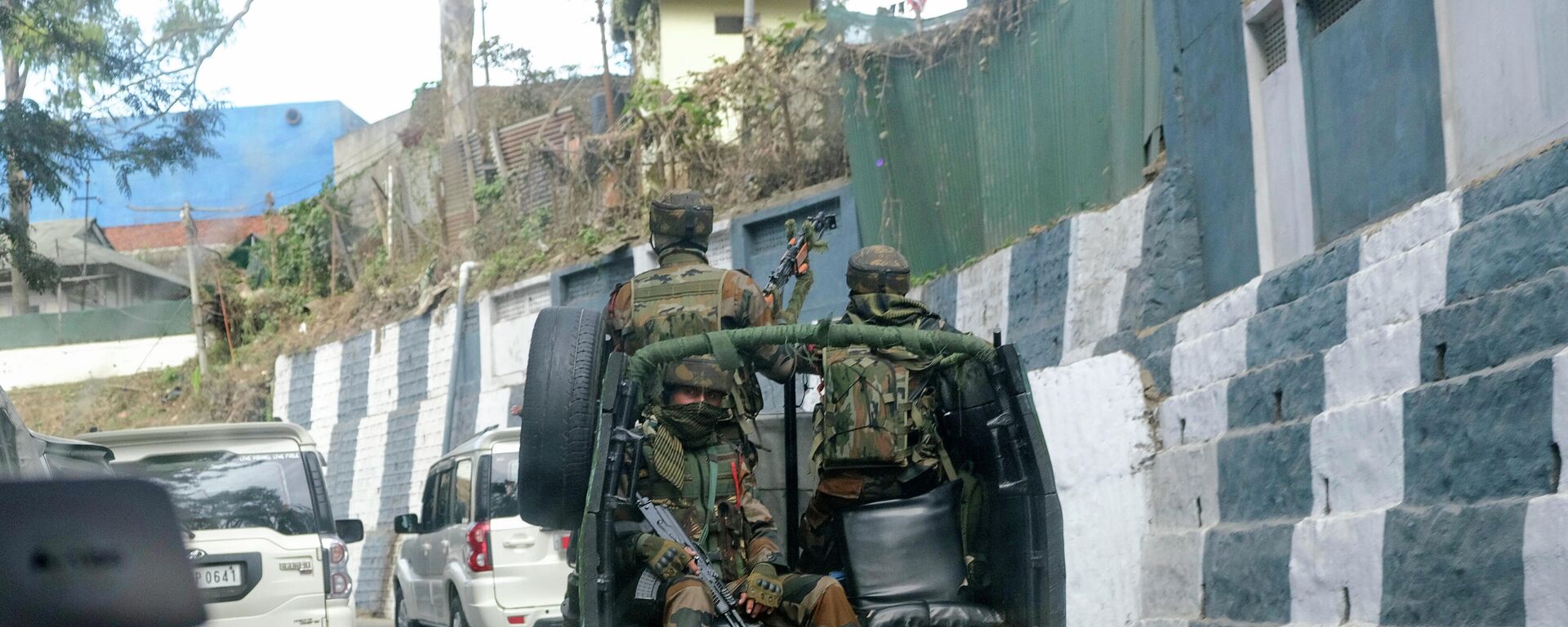 Indian army soldiers ride past the main town in a convoy in Kohima, capital of northeastern Nagaland state, India, Sunday, Dec. 5, 2021 - Sputnik International, 1920, 16.12.2021