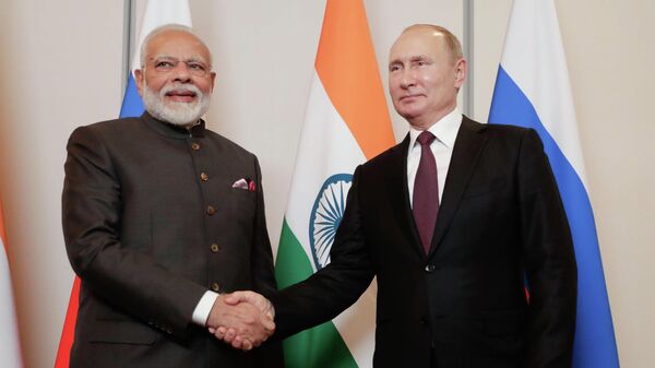 India's Prime Minister Narendra Modi, left, shakes hands with Russia's President Vladimir Putin (File) - Sputnik International