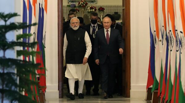  Russian President Vladimir Putin and Prime Minister of the Republic of India Narendra Modi (left) during a meeting at the Hyderabad Palace in New Delh - Sputnik International
