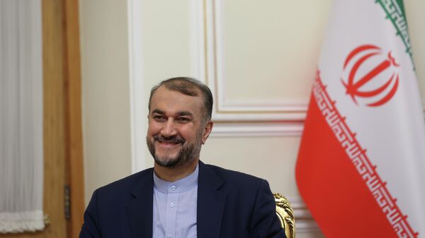 Iran's Foreign Minister Hossein Amir-Abdollahian is pictured, during a meeting with International Atomic Energy Agency (IAEA) Director General Rafael Grossi, in Tehran, Iran, November 23, 2021. - Sputnik International