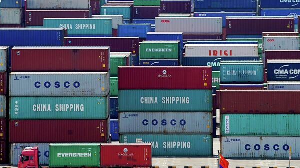 Containers are seen at the Yangshan Deep Water Port in Shanghai, China August 6, 2019 - Sputnik International