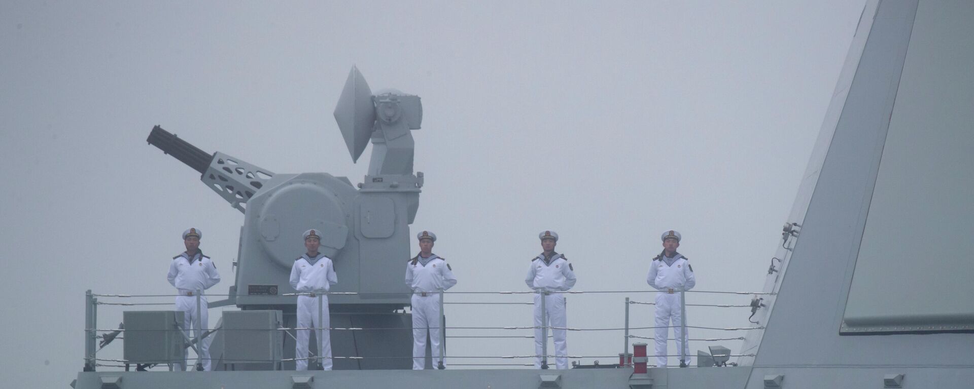 Sailors stand on the deck of the new type 055 guided-missile destroyer Nanchang of the Chinese People's Liberation Army (PLA) Navy as it participates in a naval parade to commemorate the 70th anniversary of the founding of China's PLA Navy in the sea near Qingdao in eastern China's Shandong province, Tuesday, April 23, 2019 - Sputnik International, 1920, 08.07.2022