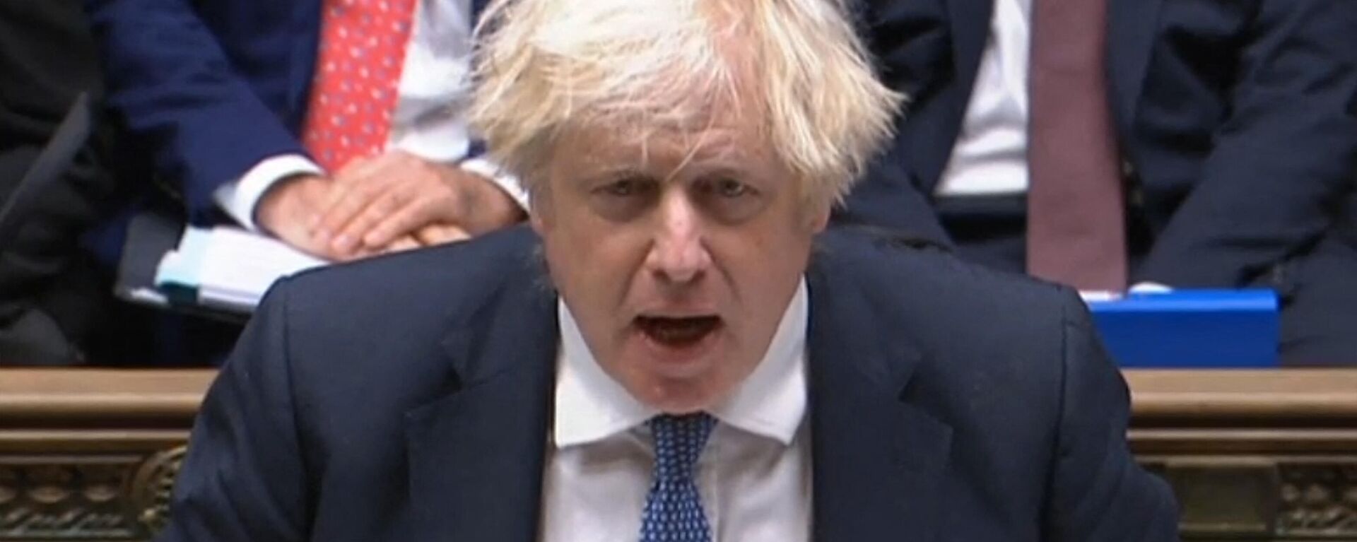 A video grab from footage broadcast by the UK Parliament's Parliamentary Recording Unit (PRU) shows British Prime Minister Boris Johnson speaking during Prime Minister's Questions (PMQs), in the House of Commons in London on December 8, 2021.  - Sputnik International, 1920, 08.12.2021