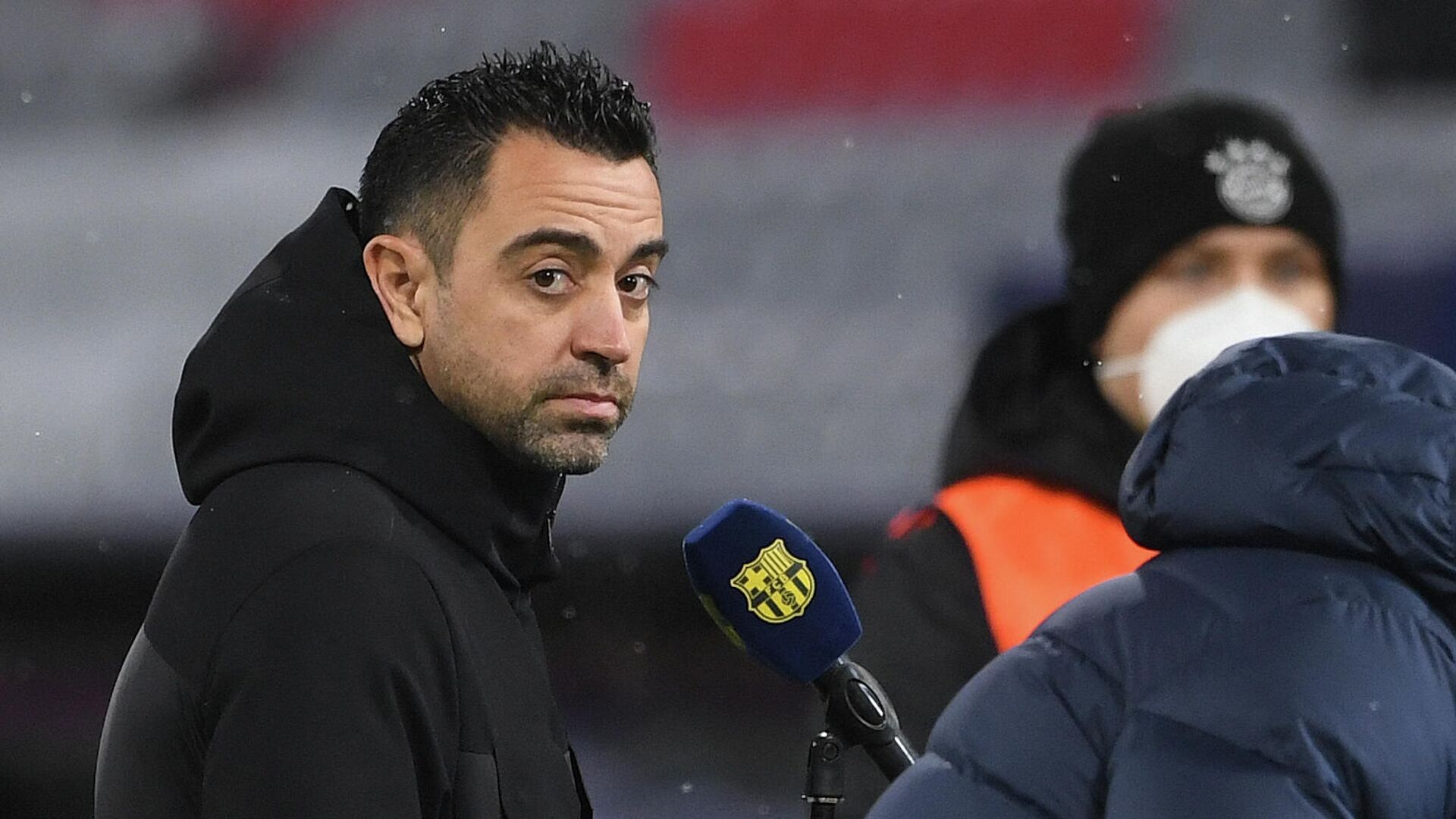Barcelona's Spanish coach Xavi gives an interview prior to the UEFA Champions League group E football match FC Bayern Munich v FC Barcelona in Munich, southern Germany on December 8, 2021. - Sputnik International, 1920, 01.01.2022