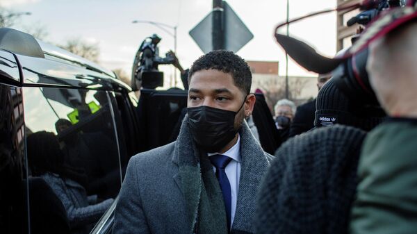 Former Empire actor Jussie Smollett leaves court during his trial for six counts of disorderly conduct on suspicion of making false reports to police, in Chicago, Illinois, U.S. December 8, 2021. - Sputnik International