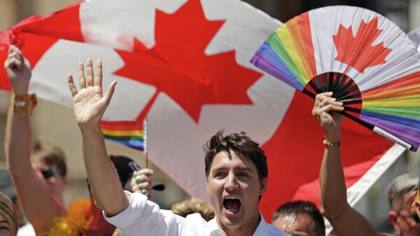 Canada's Prime Minister Justin Trudeau joins supporters of Toronto's LGBTQ community as they march in one of North America's largest Pride parades, in Toronto, Ontario, Canada June 23, 2019 - Sputnik International