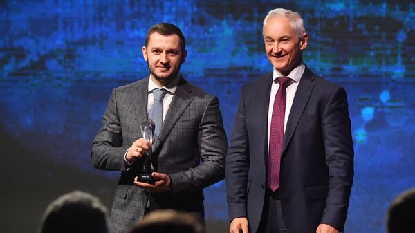 First Deputy Prime Minister Andrei Belousov (right) during the award of the winners of the All-Russian competition Exporter of the Year at the International Export Forum Made in Russia in Moscow - Sputnik International