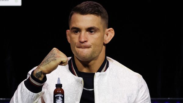 Dustin Poirier is seen on stage during the UFC 269 press conference at MGM Grand Garden Arena on December 09, 2021 in Las Vegas, Nevada. - Sputnik International