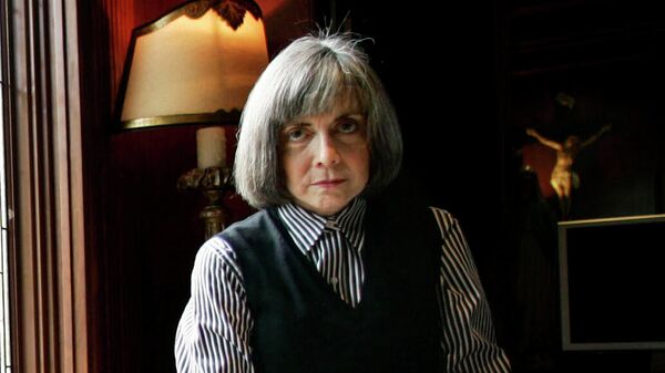 FILE - Author Anne Rice poses for a photo at her home Oct. 26, 2005, in San Diego. Rice’s “Interview with the Vampire” is rising again on screen, this time for TV. The bestselling novel, which was adapted for the 1994 Brad Pitt-Tom Cruise film, will be the basis for a new AMC and AMC+ series set for 2022. - Sputnik International